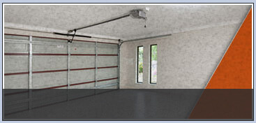 a garage interior view looking at the door