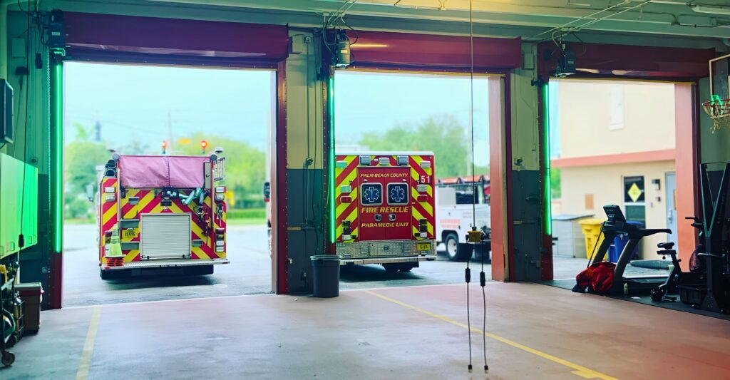 fire department's 3 open overhead garage doors