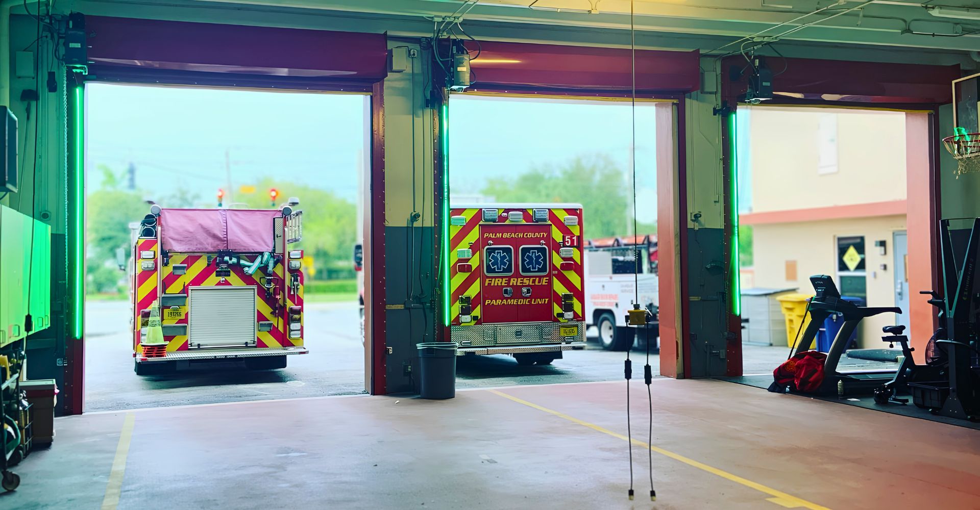 fire department's 3 open overhead garage doors